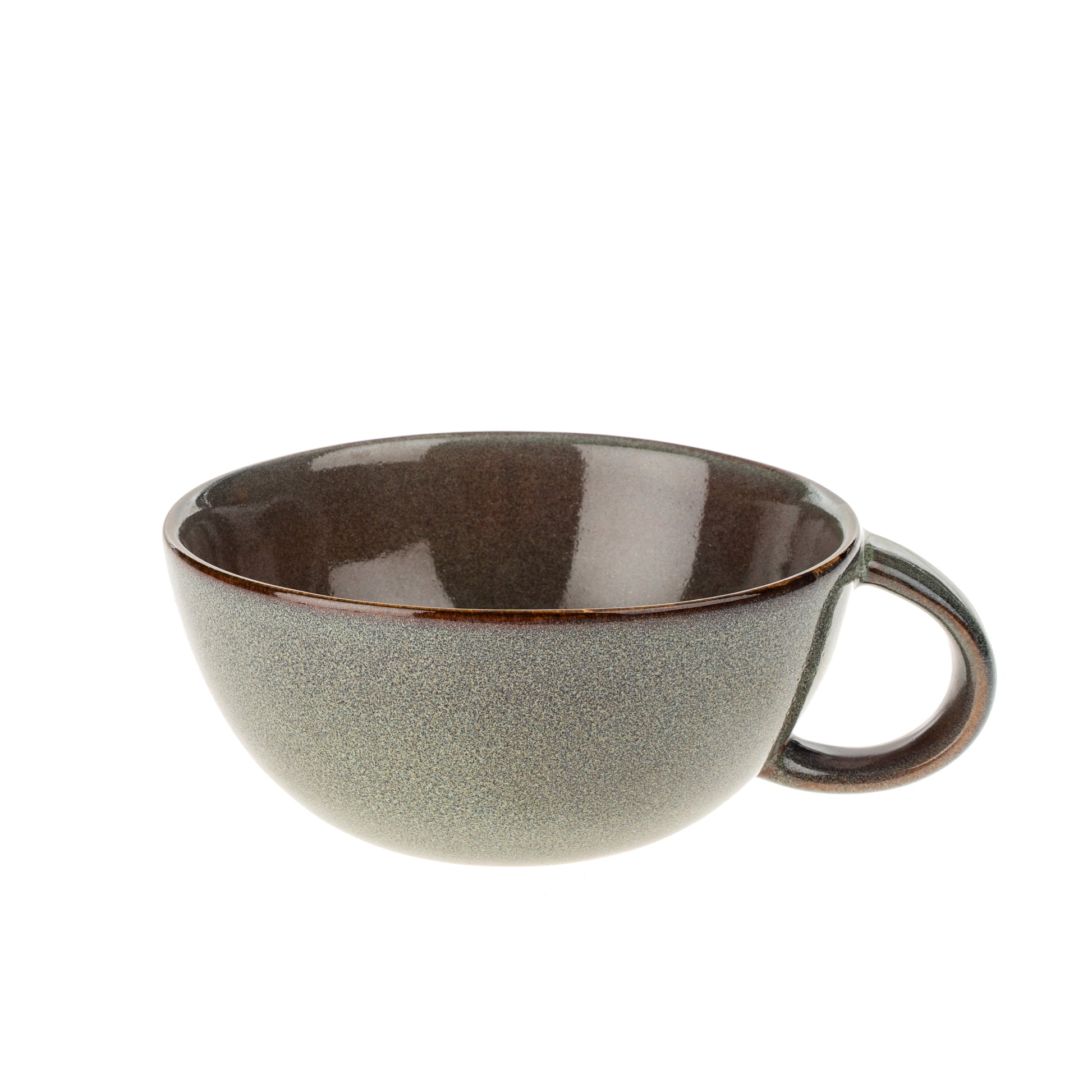 Green ceramic cup with brown interior on a white background