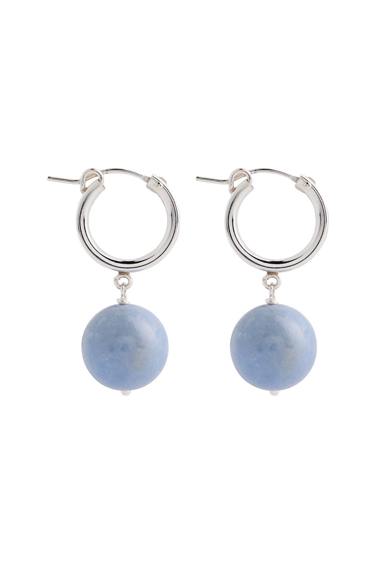 Silver hoop earrings with blue spherical stones on a white background
